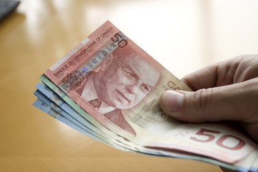 Your Guide to Obtaining Canadian Dollars: Before & During Your Trip