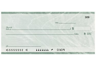 Locate Your Checking Account Number on a Check: A Simple Guide