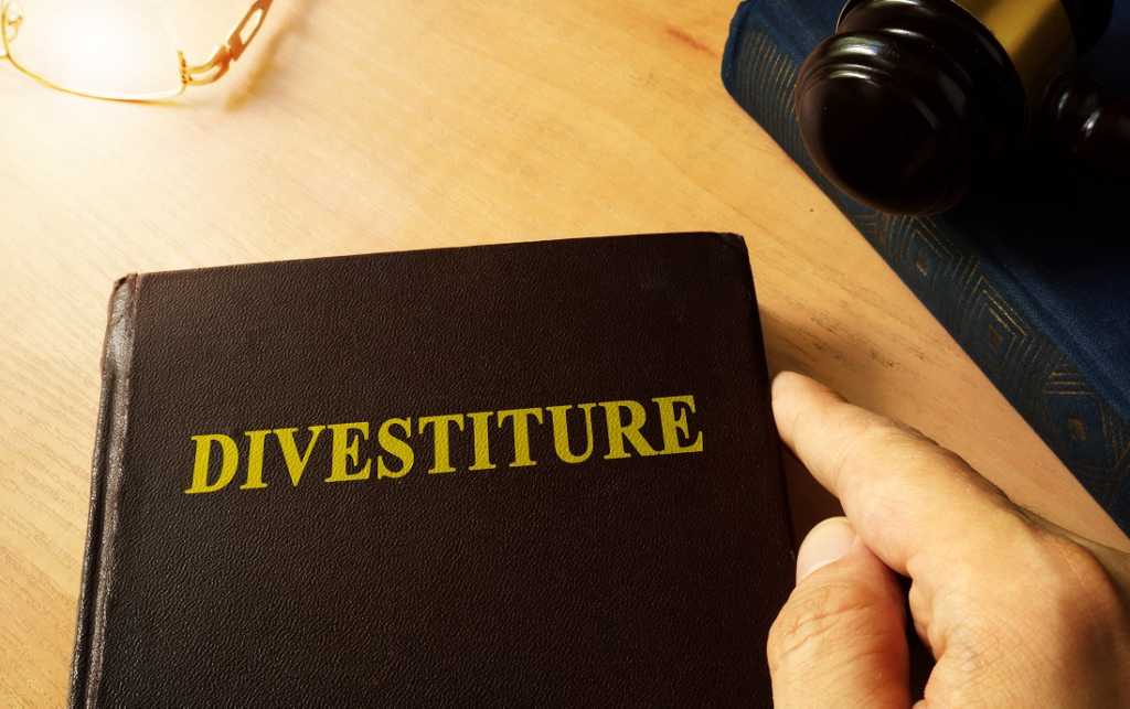 Divestiture Explained: Definition, Types & Examples